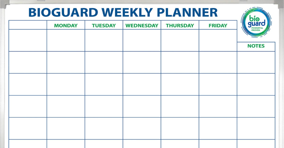 Close-up of a weekly planner board that shows blank weekday columns beneath a large title with a notes area on the side.